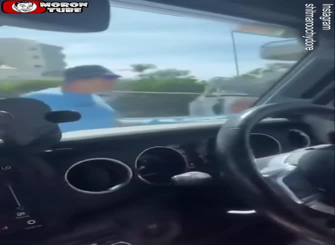 Video :In a fit of fury, a biker spits at a woman